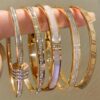 Set of 2 Stainless Steel Bracelets in a Non-Fading Golden Color, Adorned with Rhinestones, Unisex Fashionable Jewelry Suitable for All Occasions.